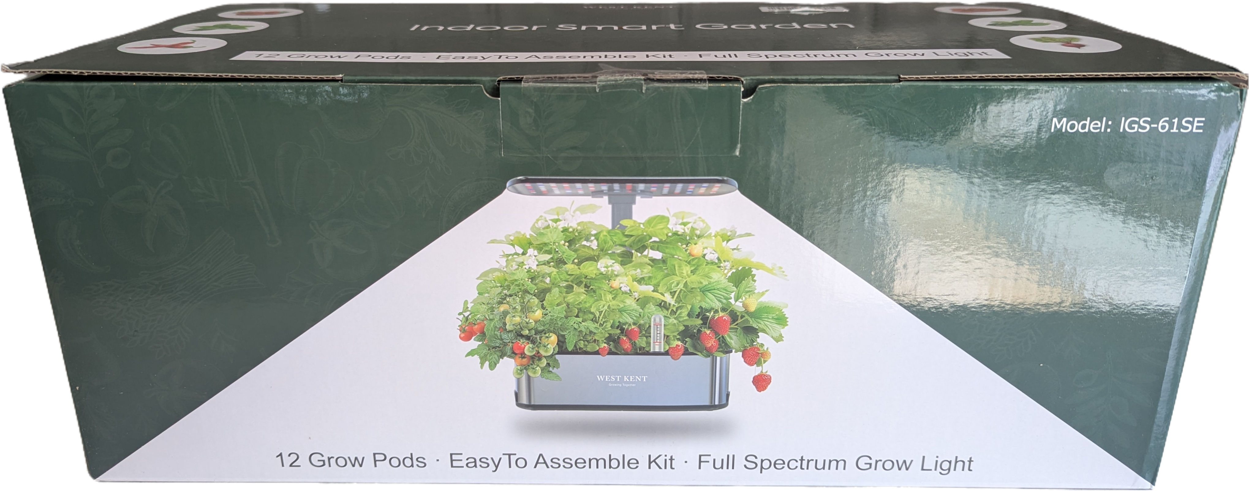 Indoor smart garden kit packaging with grow pods and light on a white background