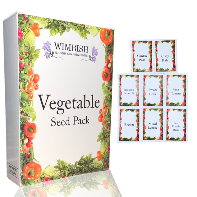 Vegetable seed pack box with seed name packets next to it
